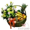 цветы и фрукты в большой корзине